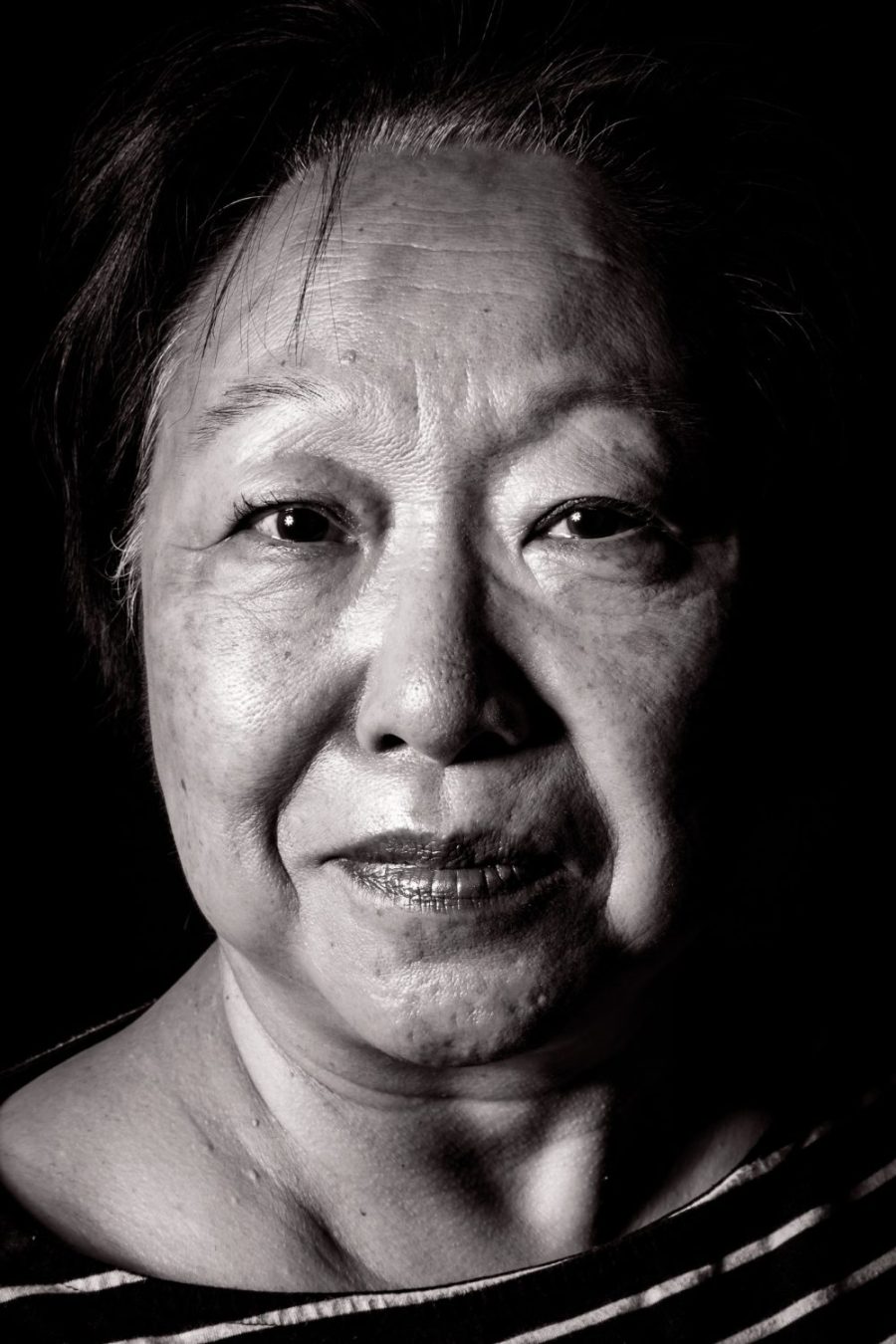 Black and white portrait of an older asian woman