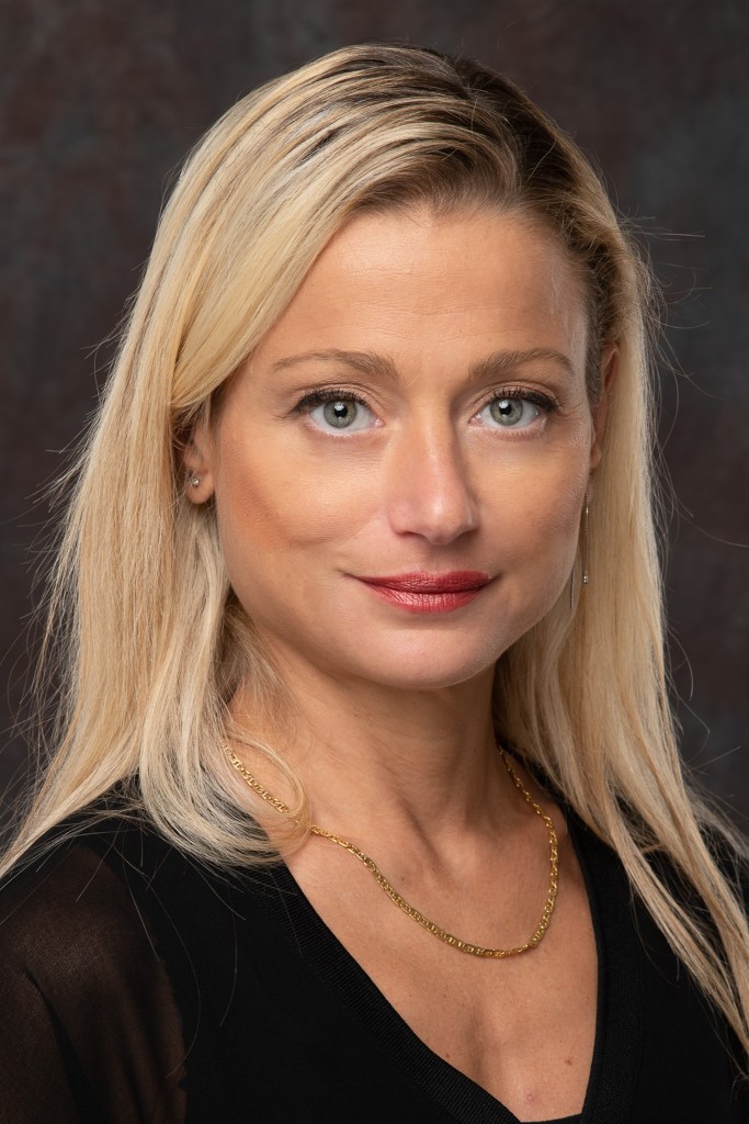 Portrait of a blonde woman with green eyes 